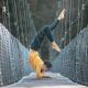 Sabrina, modèle brune pose artistique armstand sur un pont suspendu - fredvaudroz de Montreux. Annuaire photographe